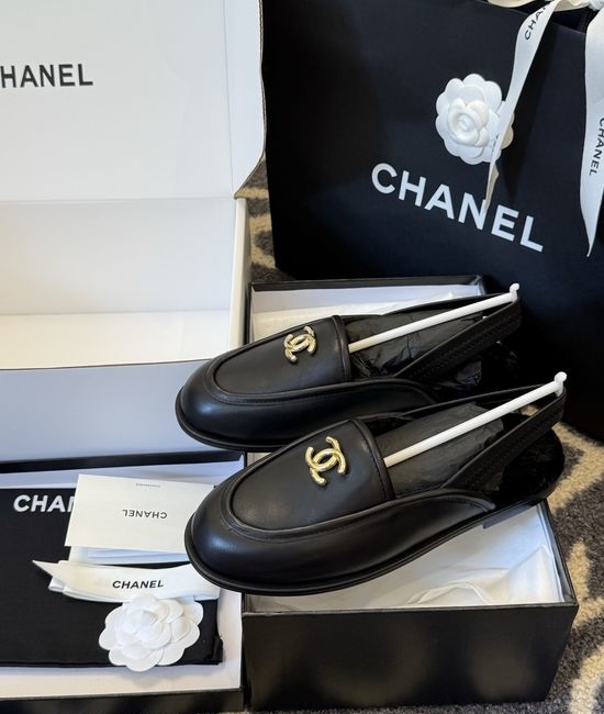 Chanel Faux Fur Lined Suede Mules With Leather Sole