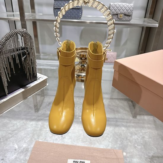 Miu Miu Leather Ankle Boots with Metal Accent and Chunky Heel