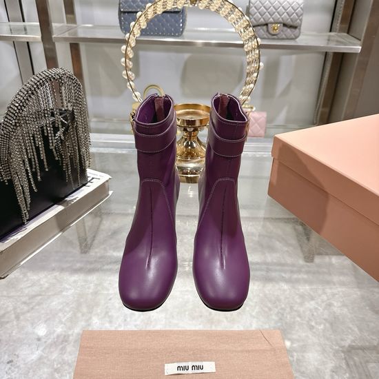 Miu Miu Leather Ankle Boots with Metal Accent and Chunky Heel