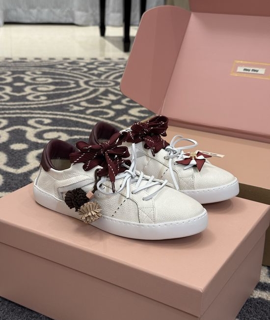 Miu Miu Cute Low Top Sneakers with Decorative Charm Details