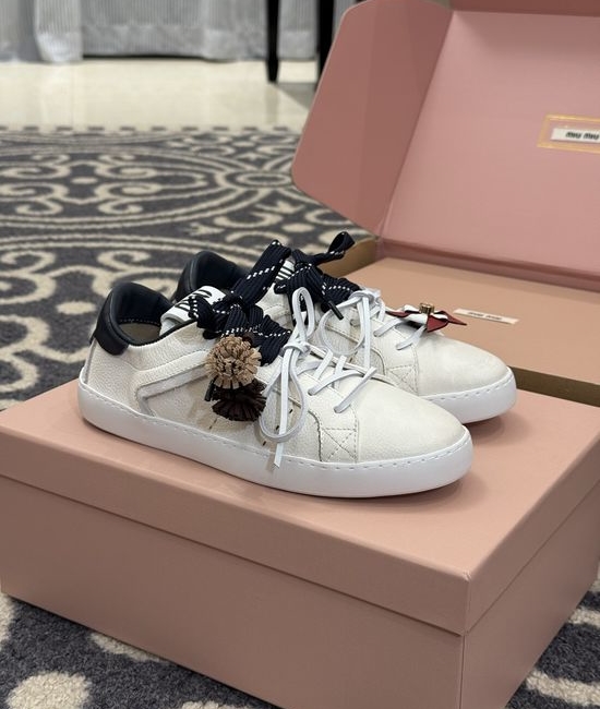 Miu Miu Cute Low Top Sneakers with Decorative Charm Details
