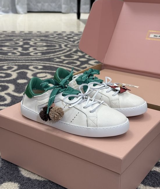 Miu Miu Cute Low Top Sneakers with Decorative Charm Details