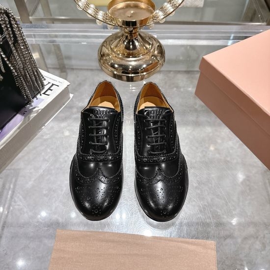 Miu Miu Sophisticated Brogue Oxfords with TPU Outsole