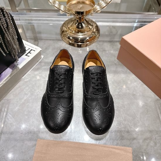 Miu Miu Sophisticated Brogue Oxfords with TPU Outsole
