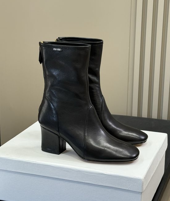 Miu Miu Knee High Stretch Boots With Decorative Metal Buckle