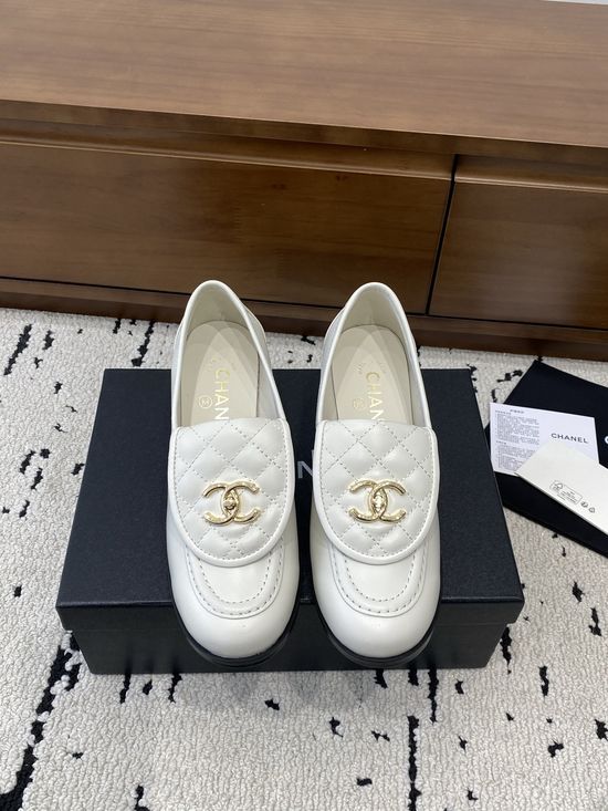 Chanel Elegant Leather Loafers with Decorative Buckle