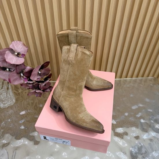 Miu Miu Pointed-Toe Knight Boots with Sleek Silhouette