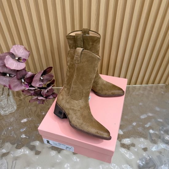 Miu Miu Pointed-Toe Knight Boots with Sleek Silhouette