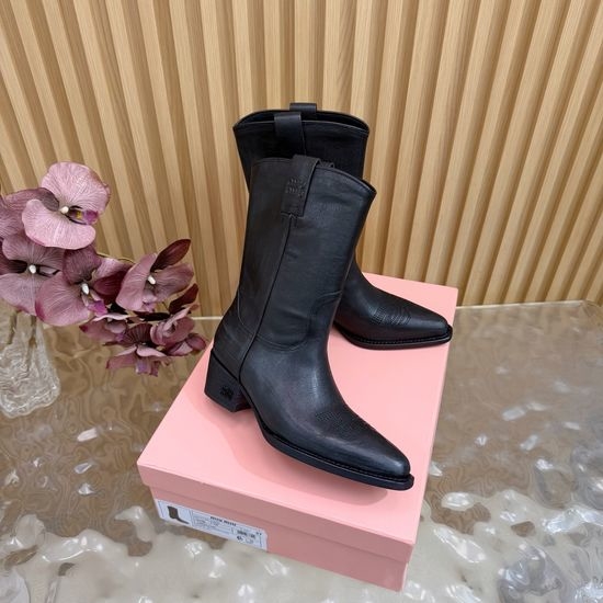 Miu Miu Pointed-Toe Knight Boots with Sleek Silhouette