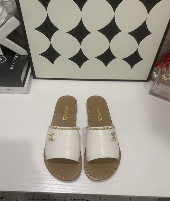 Chanel Genuine Leather Slip On Shoes with Metal Hardware