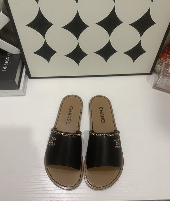 Chanel Genuine Leather Slip On Shoes with Metal Hardware
