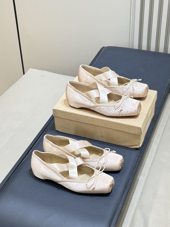 Christian Louboutine Elegant Ballet Flats with Bow and Cut-Out Design