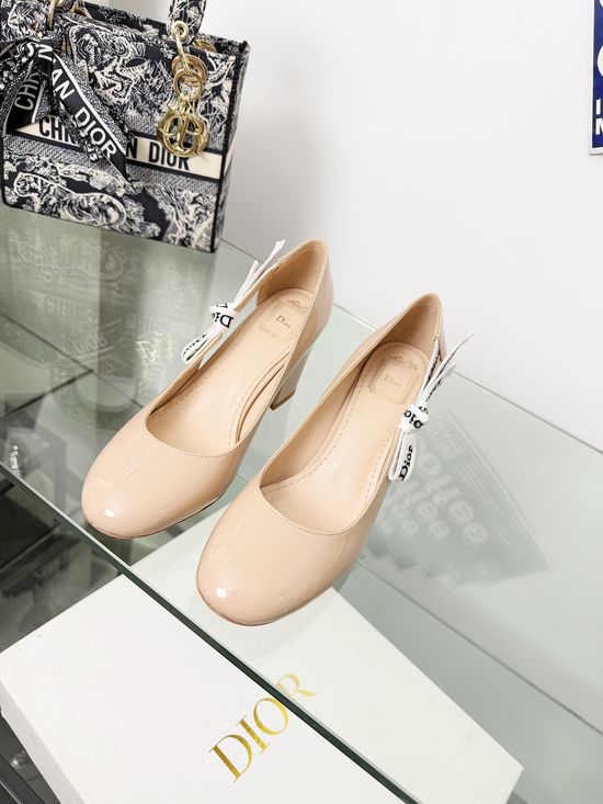 Christian Dior Elegant Ballet Flats with Lace-Up Detail and Bow
