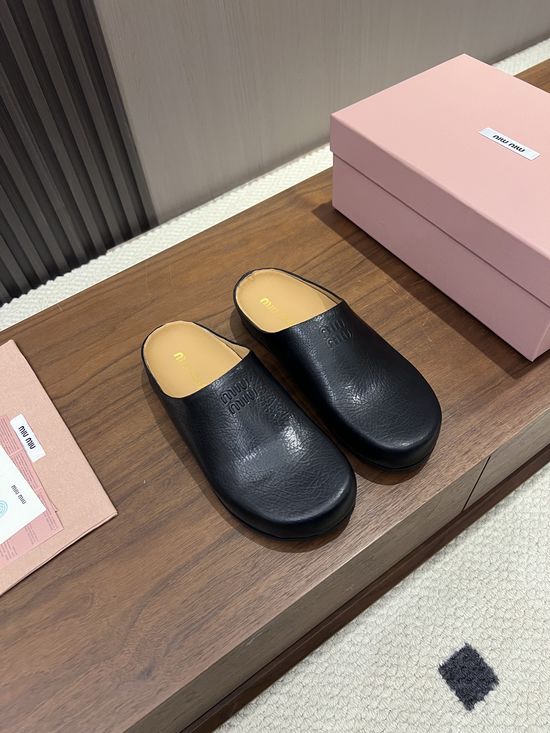 Miu Miu Hidden Lift Casual Clog Shoes With Embossed Logo
