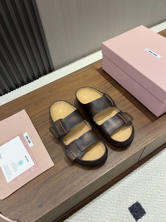 Miu Miu Hidden Lift Casual Clog Slippers With Embossed Logo