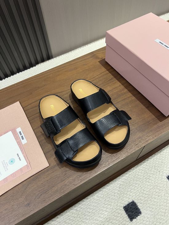 Miu Miu Hidden Lift Casual Clog Slippers With Embossed Logo