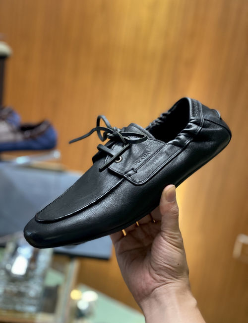 Prada Distressed Leather Lace-up Shoes