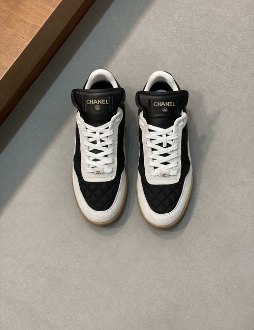 Chanel Quilted Leather Sneakers With Logo