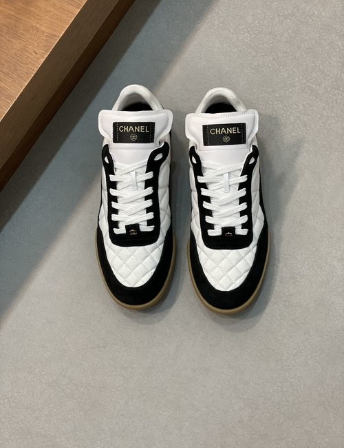 Chanel Quilted Leather Sneakers With Logo