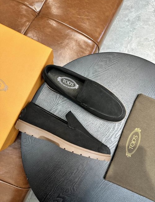 Tods Calfskin Loafers With Woven Trim Soles