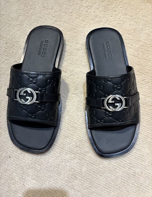 Gucci Interlocking G Slides. Classic Design. Leather Details.