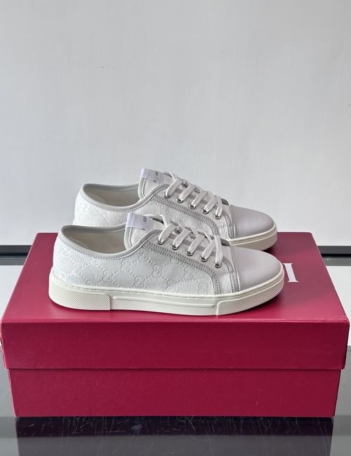 Gucci GG Embossed Leather Sneakers