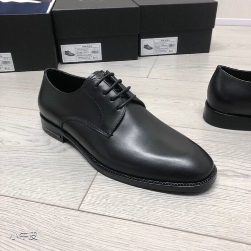 Prada Patent Leather Loafers With Logo Buckle