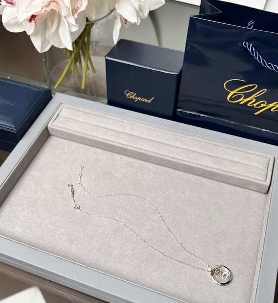 Chopard Dainty Sun Moon Star Pendant Necklace