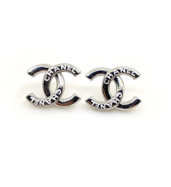 Chanel White Letter Stud Earrings Brass Material