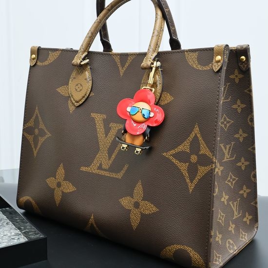 Louis Vuitton LV Cute Exquisite Doll Pendant Keychain
