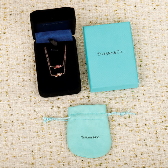Tiffany & Co. Elegant Silver Knot Pendant Necklace