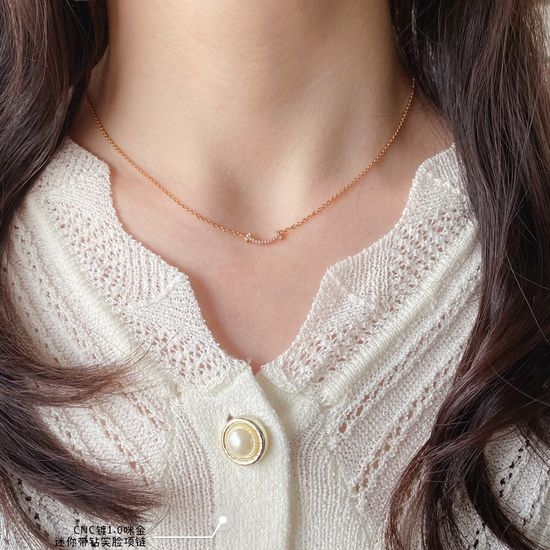 Tiffany & Co. Mini Diamond Inlaid Smile Necklace