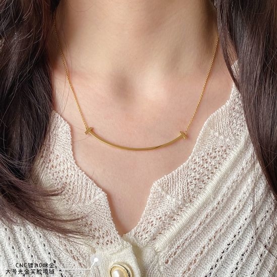 Tiffany & Co. Large Gold Smile Pendant Necklace