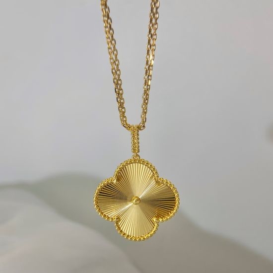 Van Cleef & Arpels VCA Carved Clover Pendant Necklace