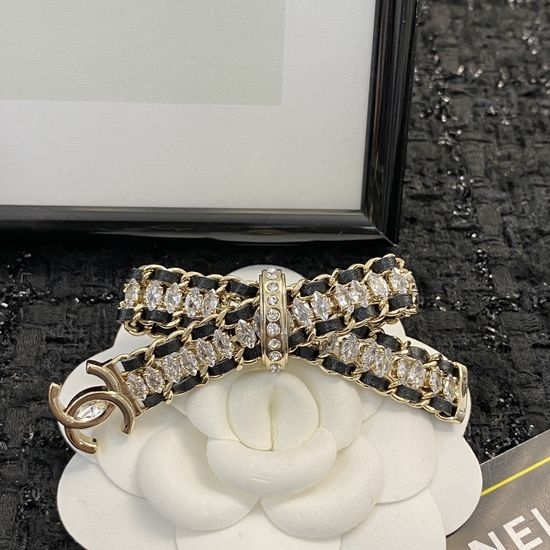 Chanel Leather Rhinestone Bow Brooch