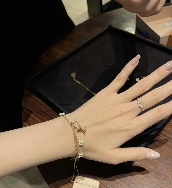 Louis Vuitton LV Floral Charm Bracelet in Yellow Gold Tone