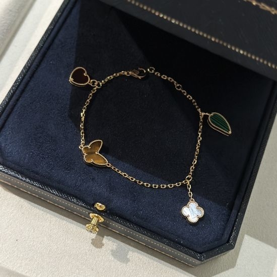 Van Cleef & Arpels VCA Four-Flower Bracelet with Assorted Gems