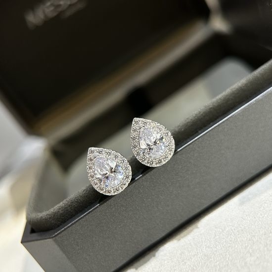 De Beers Sparkling Three Carat Stud Earrings