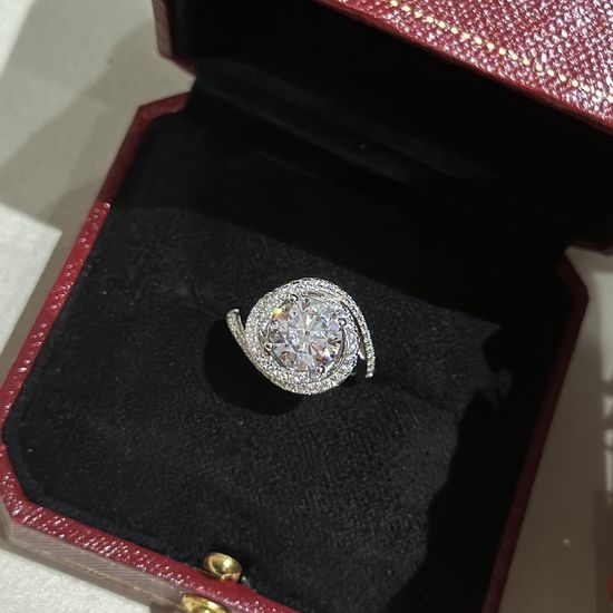 Cartier Sparkling Twisted Round Diamond Ring