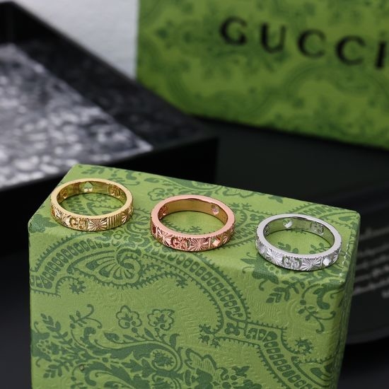 Gucci Engraved Gold Band Ring