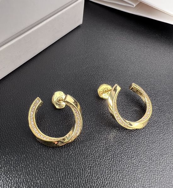Celine Twisted Half Diamond Stud Earrings