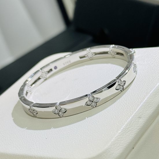 Van Cleef & Arpels VCA Sterling Silver Four Diamond Flower Bangle