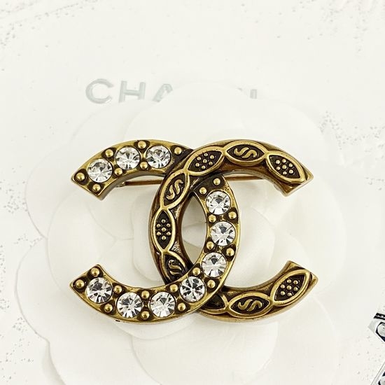 Chanel Vintage Gold Half Diamond Brooch Elegant