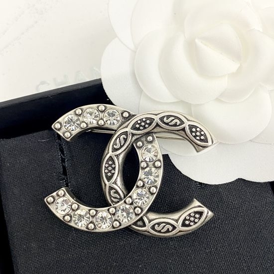 Chanel Vintage Silver Half Diamond Brooch Sophisticated