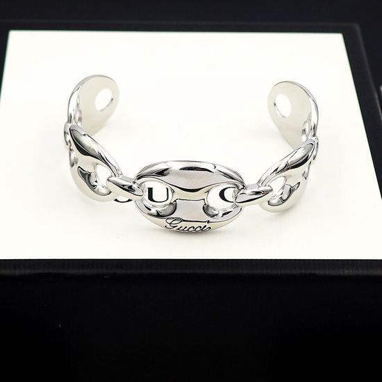 Gucci Gold Tone Engraved Bangle