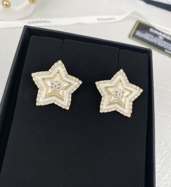 Chanel Diamond Inlaid Star Resin Earrings