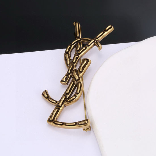 Yves Saint Laurent YSL Elegant YSL Brooch