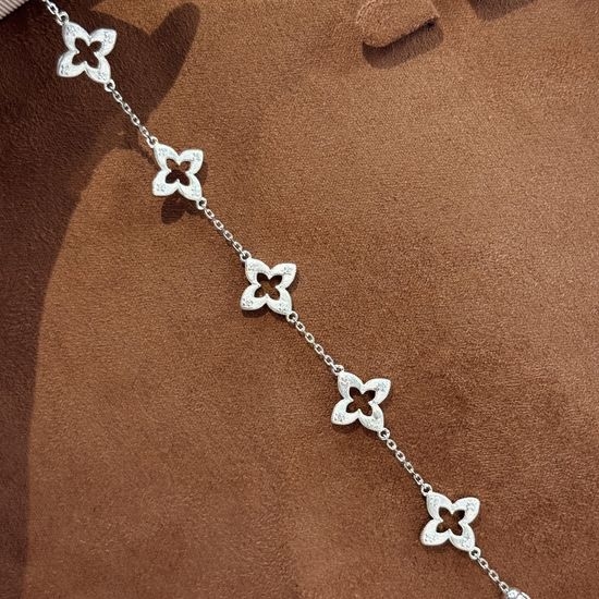 Van Cleef & Arpels VCA Hollow Four Leaf Clover Silver Bracelet