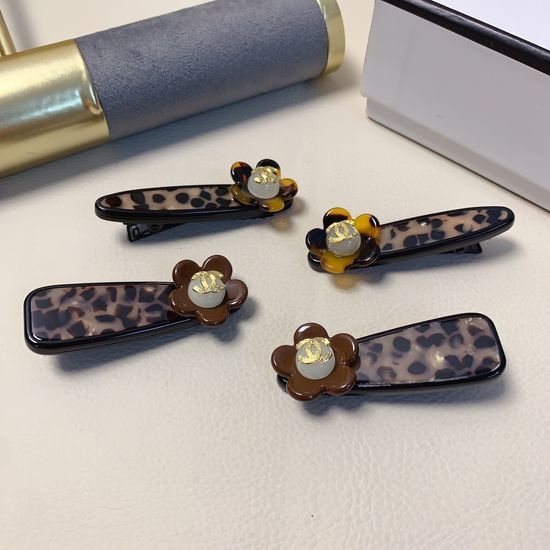 Chanel Leopard Sunflower Hair Clips