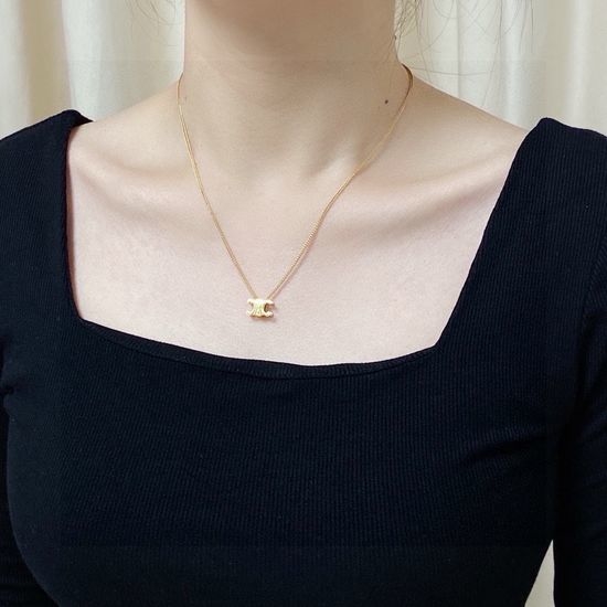 Celine Adjustable Hollow Carved Pendant Necklace